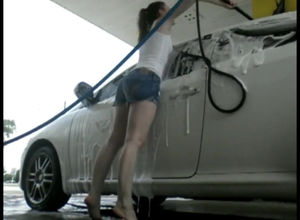 Slender damsel car washer displaying